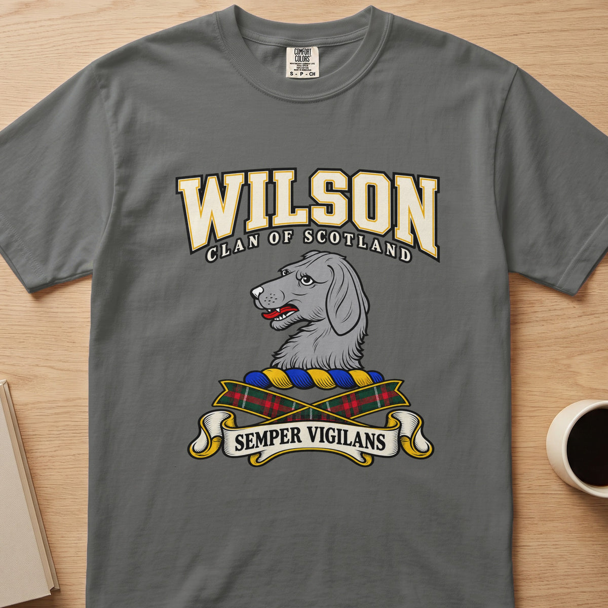 Wilson gray dog’s-head crest graphic on a charcoal gray Comfort Colors T-shirt, front view