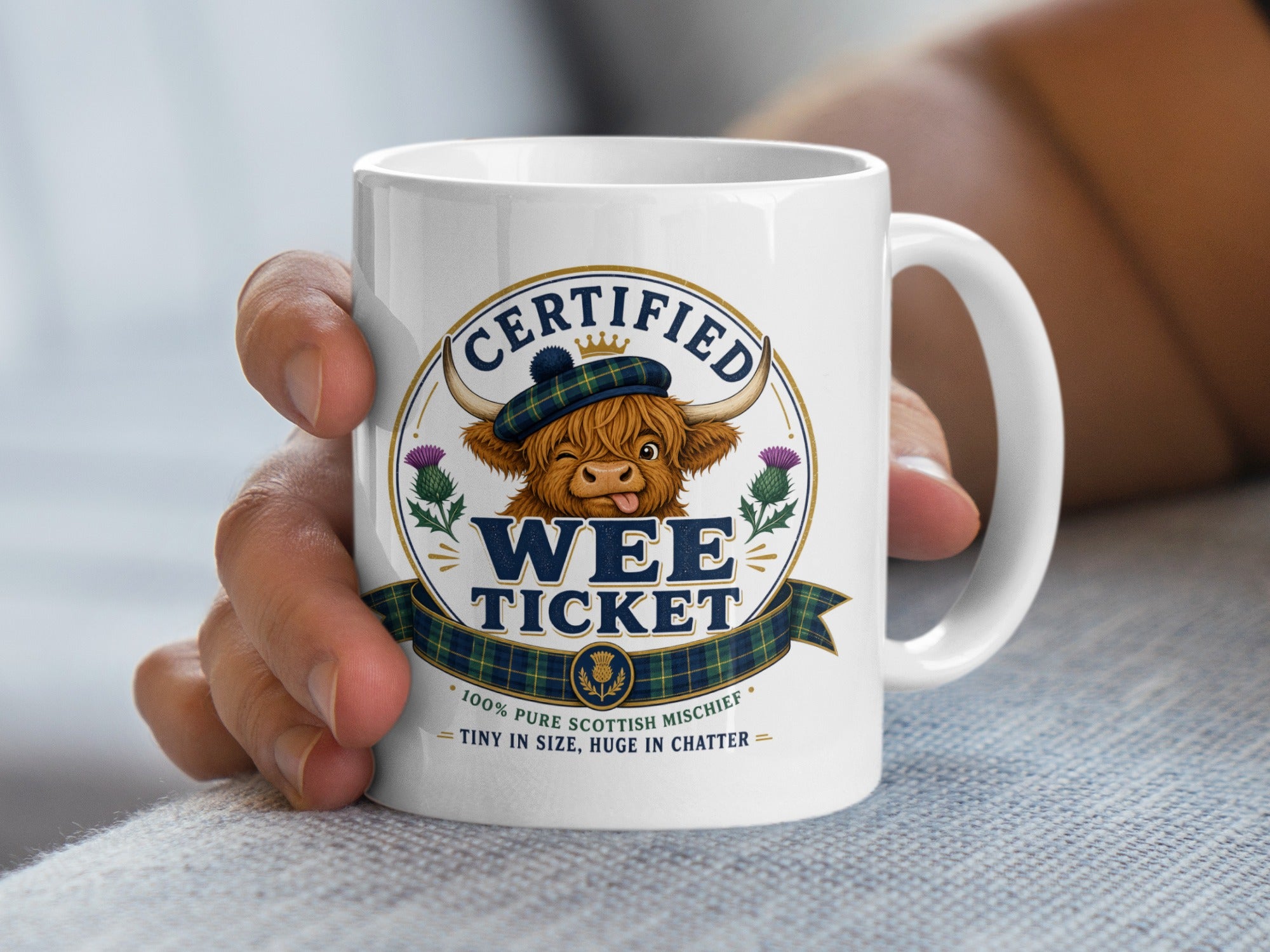 Mug with "Certified Wee Ticket" logo and Scottish Highland cow graphic.