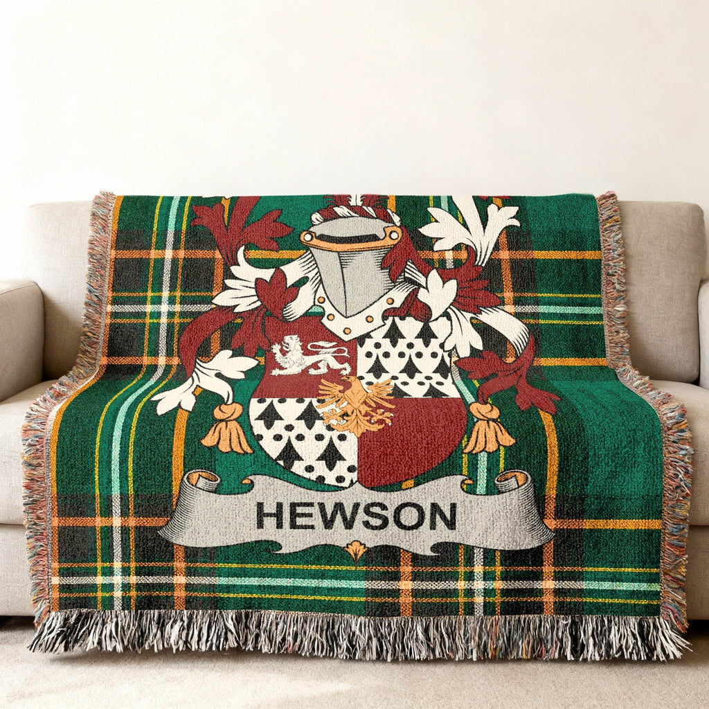 Tartan blanket with Hewson family crest displayed centrally.