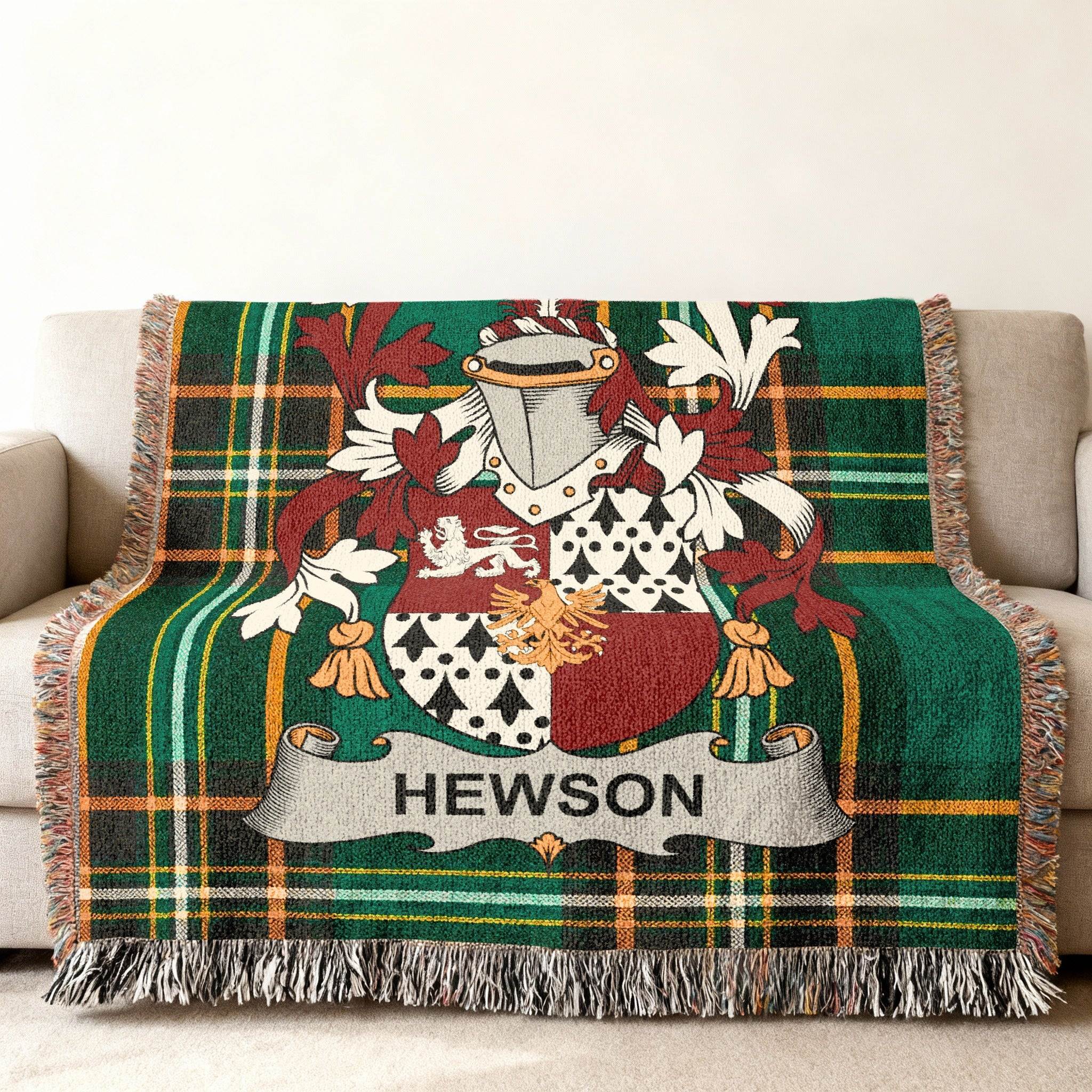 Tartan blanket with Hewson family crest displayed centrally.