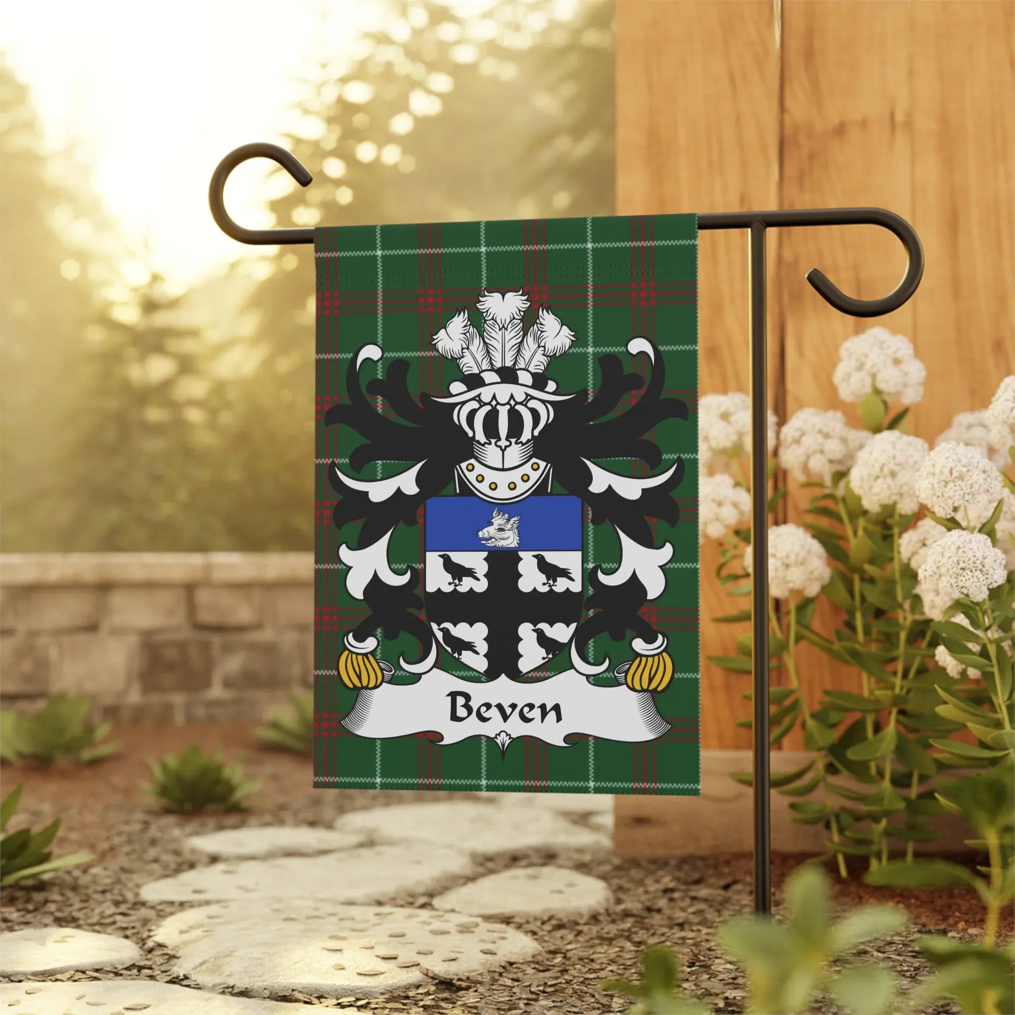 Green plaid garden flag with the Beven family crest.