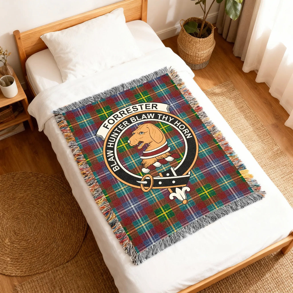 Forrester clan tartan woven blanket close-up — cotton yarn construction, crest and motto Blaw Hunter Blaw Thy Horn