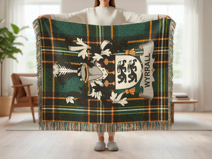Tartan blanket with a crest displaying "WYRRALL" text.