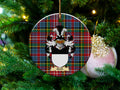Airth Scottish clan ceramic ornament with family crest on a Caledonia tartan background, hanging on a Christmas tree