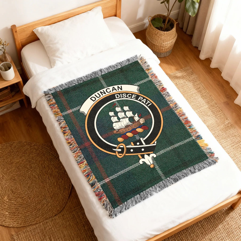 Duncan Disce Pati family crest woven blanket — tartan background design