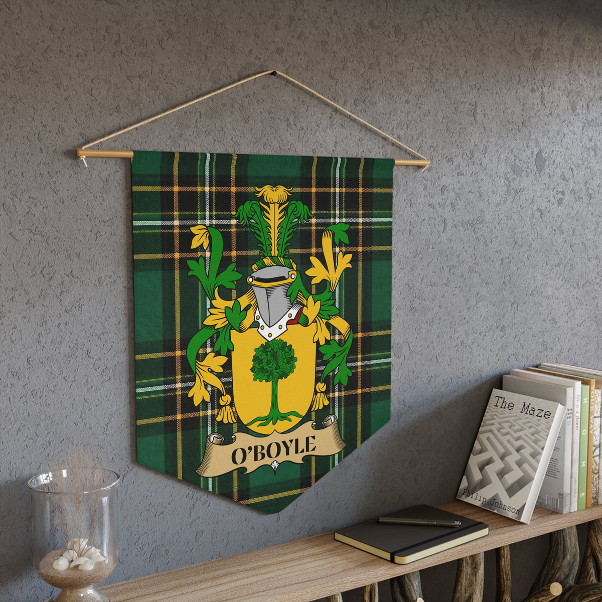 O'Boyle family crest banner on green tartan with a tree and shield.