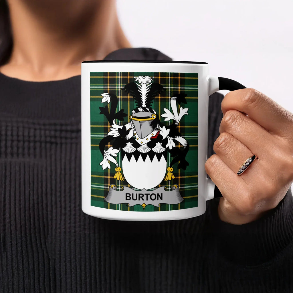 White mug with black handle displaying a green plaid pattern and the "BURTON" coat of arms.