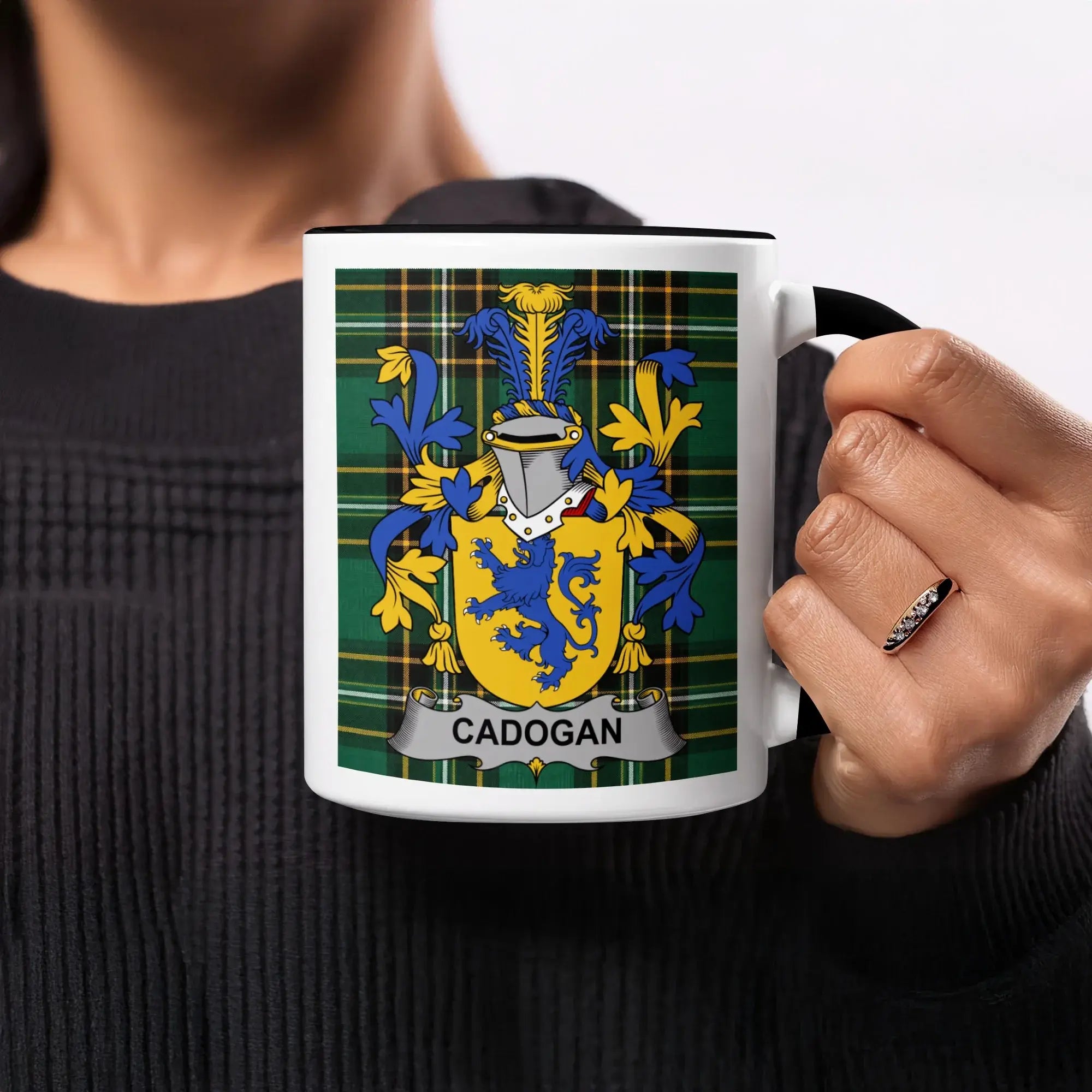 Mug with Cadogan coat of arms on tartan background.