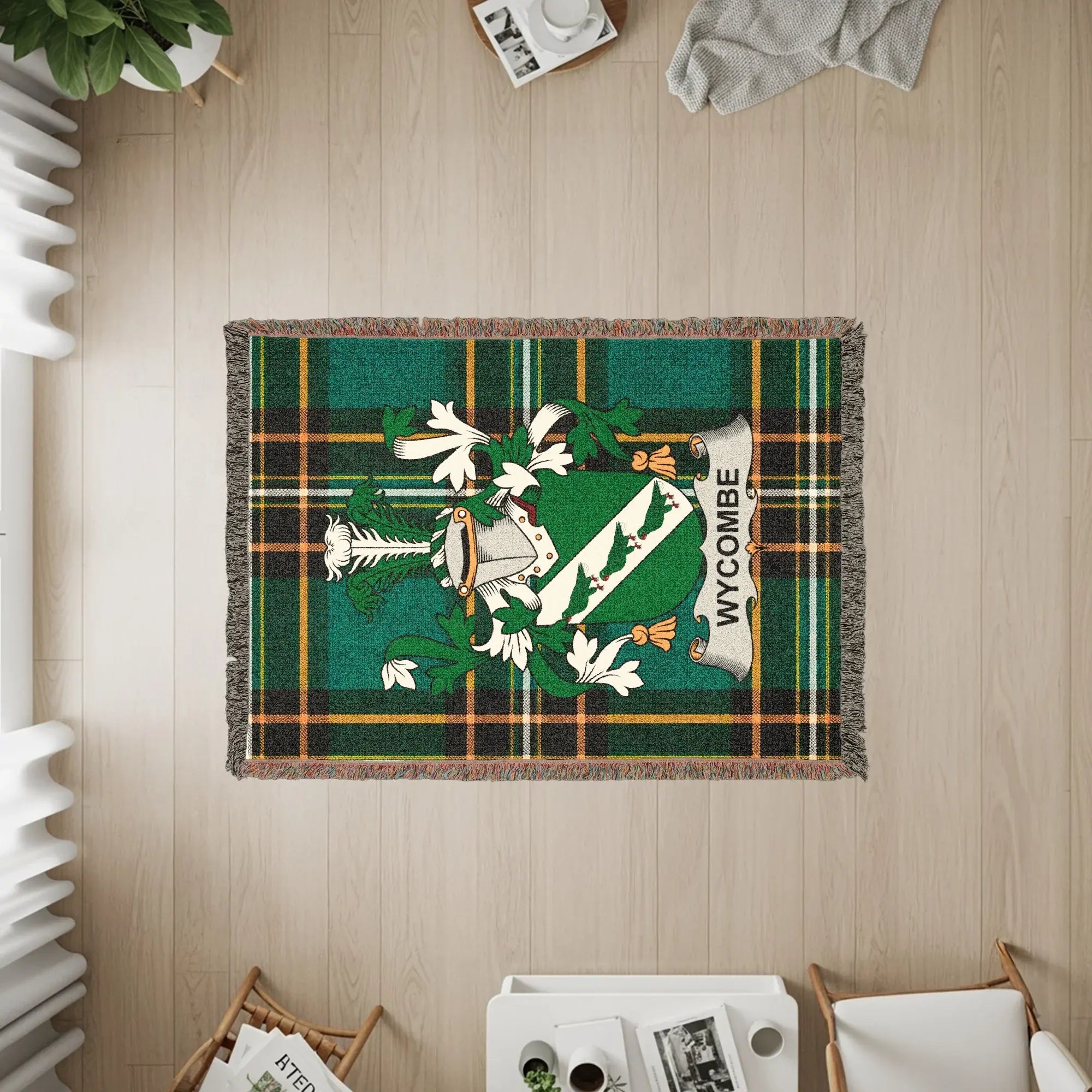 Wycombe tartan rug featuring a coat of arms with text.