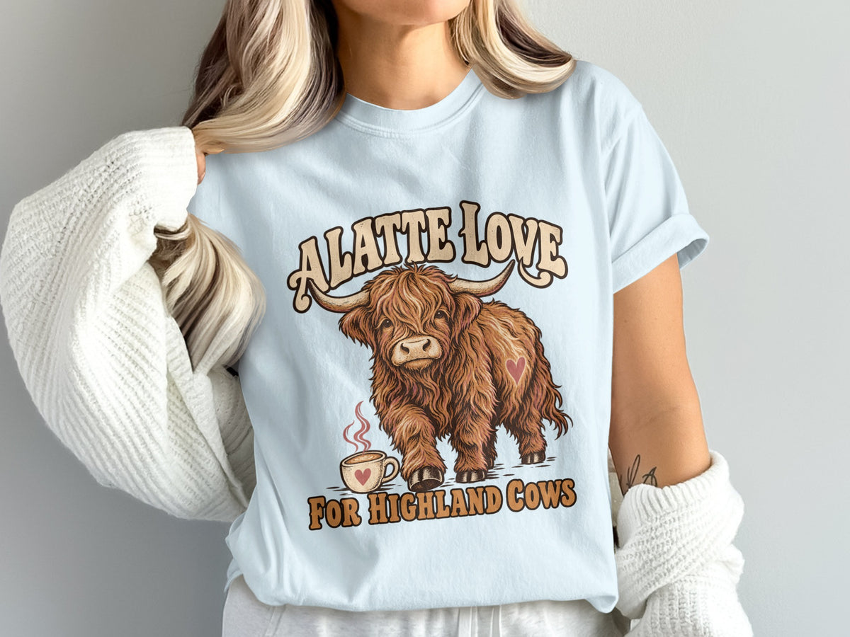 Model wearing the A Latte Love for Highland Cows Highland cow Comfort Colors T-shirt in Chambray
