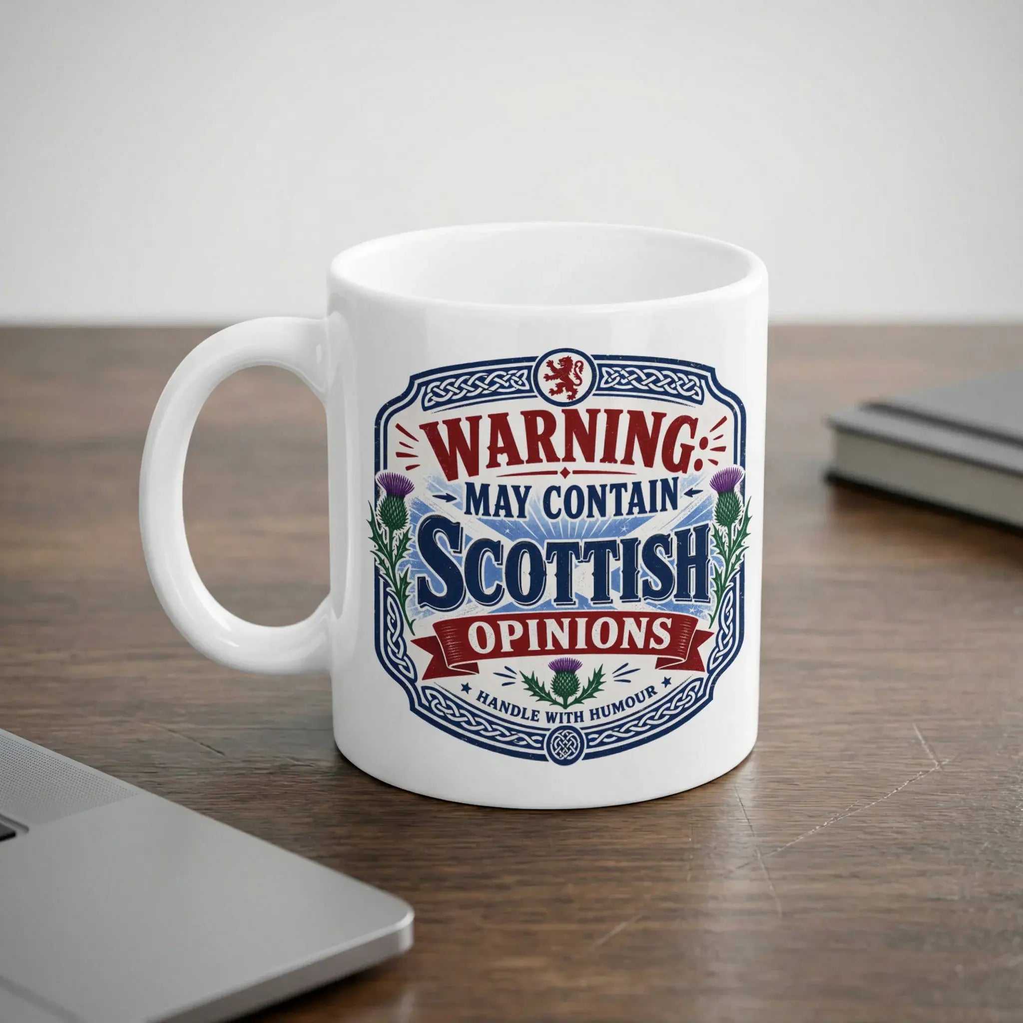 White mug with "Warning: May Contain Scottish Opinions" text and Scottish emblems.