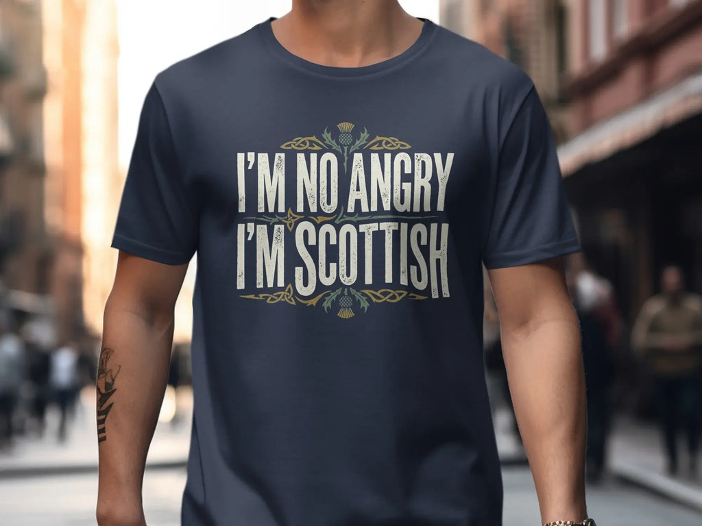 Navy t-shirt with "I'M NO ANGRY I'M SCOTTISH" text and Scottish thistle design.
