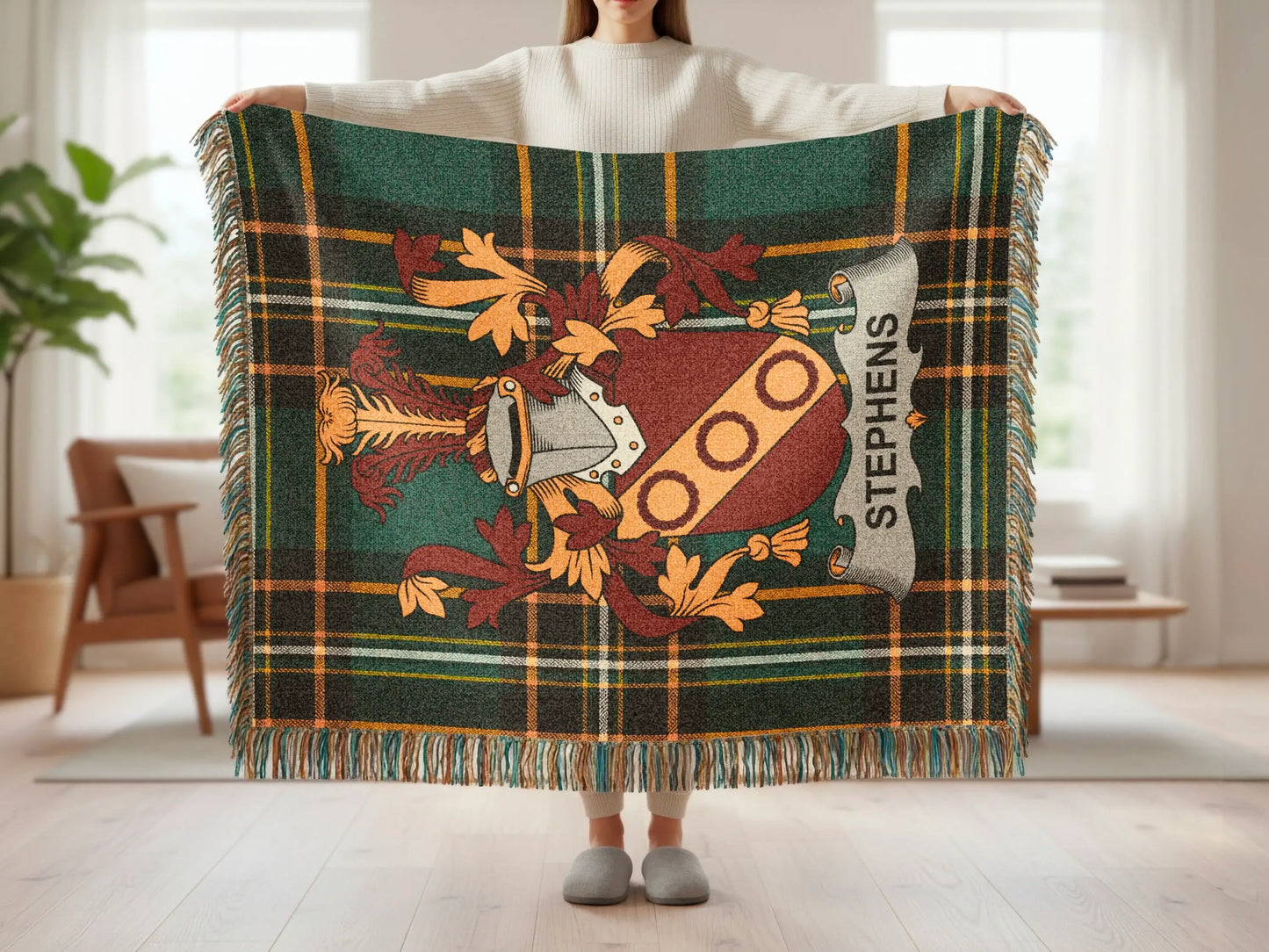 Crest with "STEPHENS" on a green and brown plaid tartan blanket.