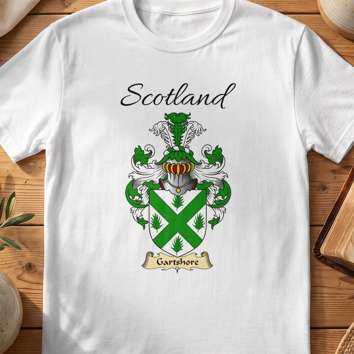 White Garthshore Scottish family shield T-shirt featuring a green diagonal cross on a white shield