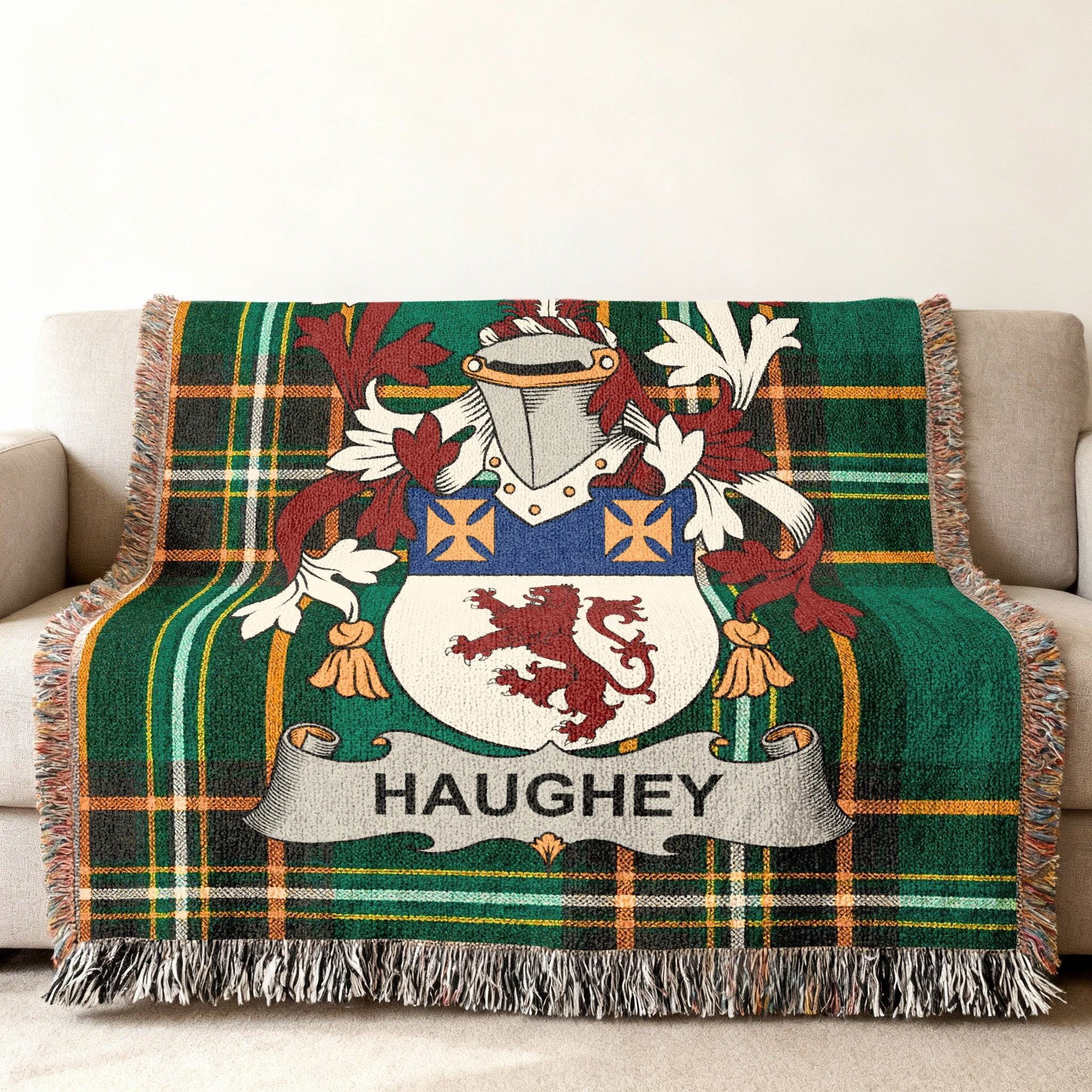 Plaid throw blanket with Haughey family crest.