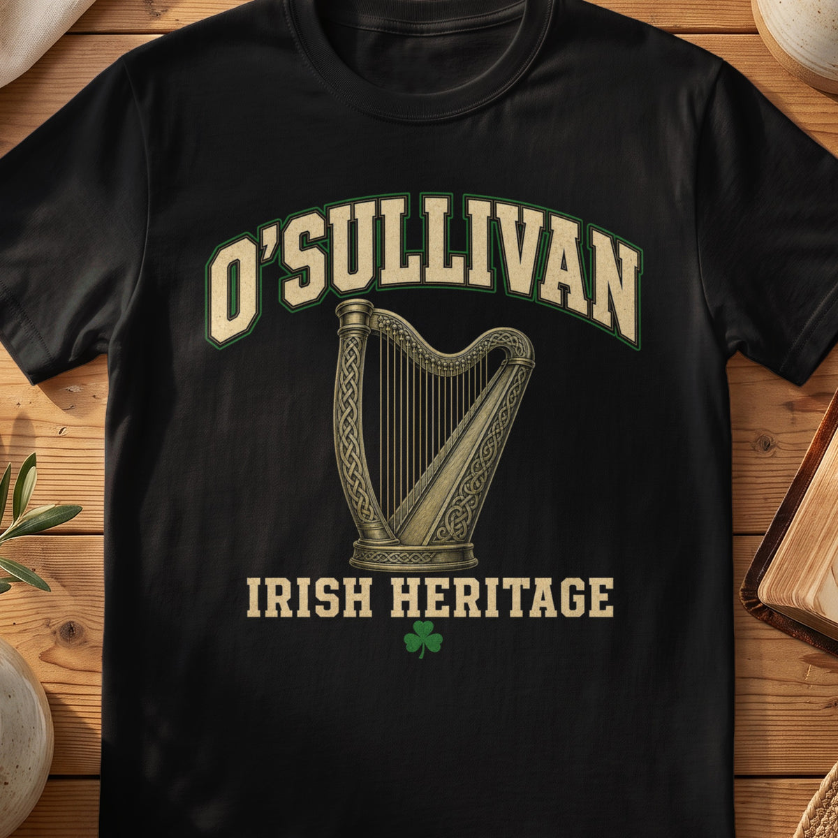 O'Sullivan Irish harp T-shirt in Black, with cream surname lettering, a gold-toned harp, green shamrock and “Irish Heritage” text.