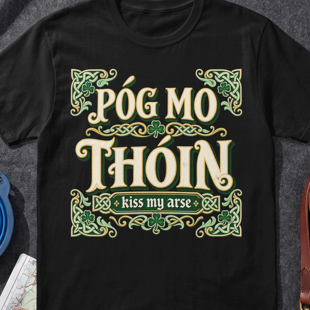 Póg Mo Thóin Irish graphic T-shirt in Black, flat-lay mockup