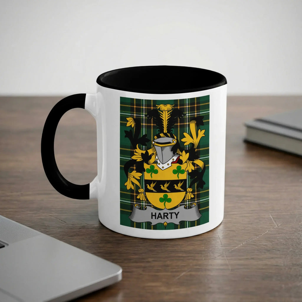 White mug with black rim featuring the Harty family crest and tartan.