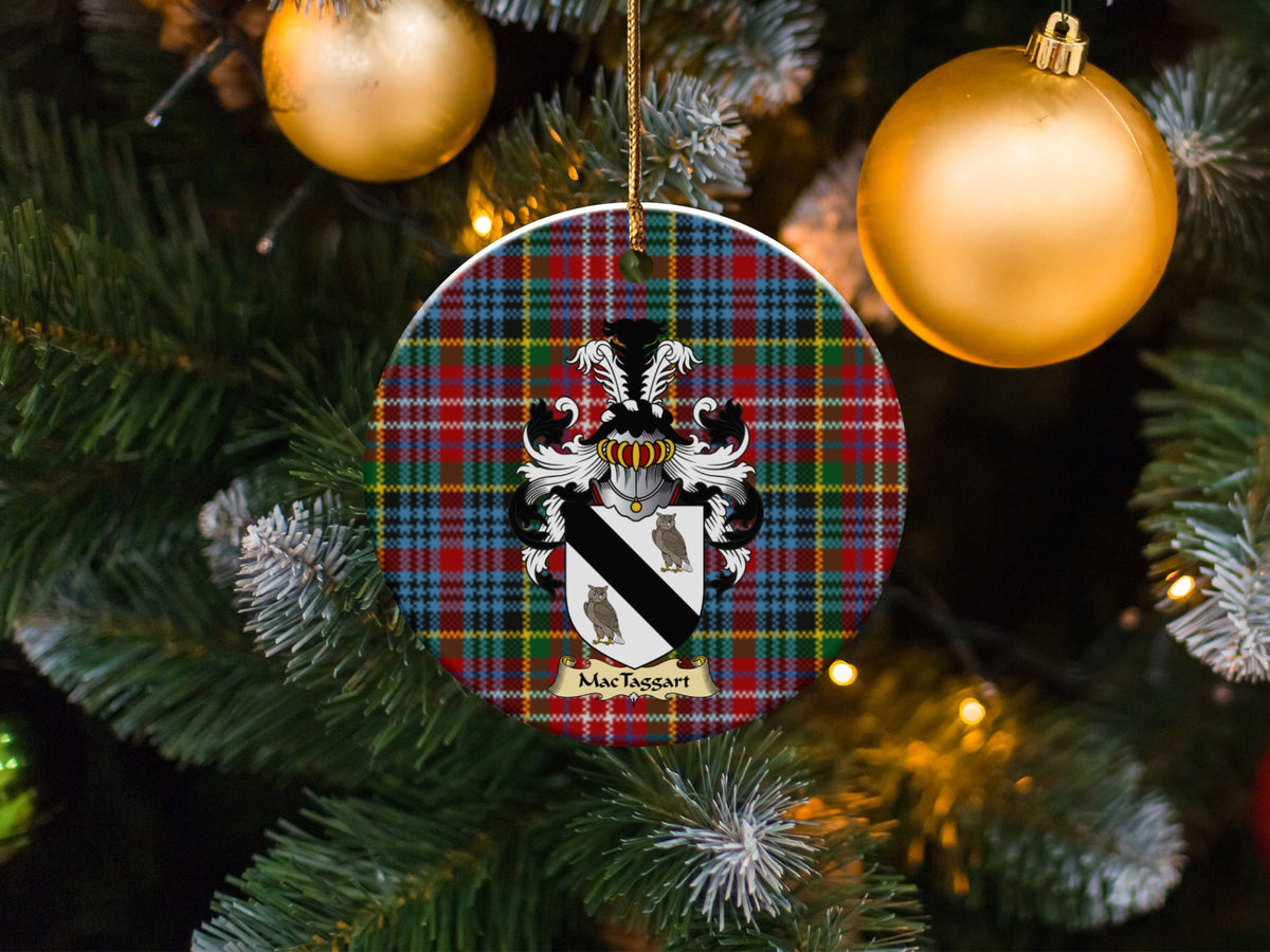 MacTaggart family emblem ceramic Christmas ornament with Caledonia tartan background in festive holiday décor