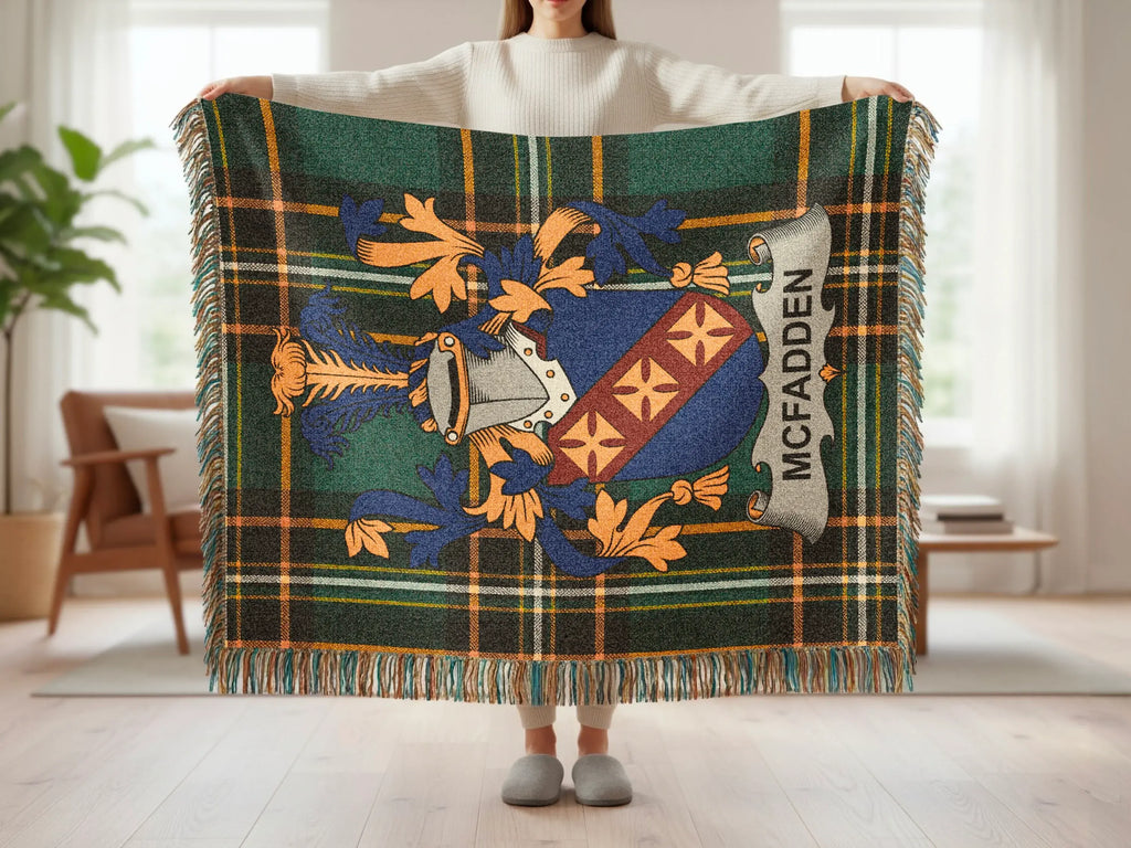 Tartan blanket with the McFadden clan crest and fringe.