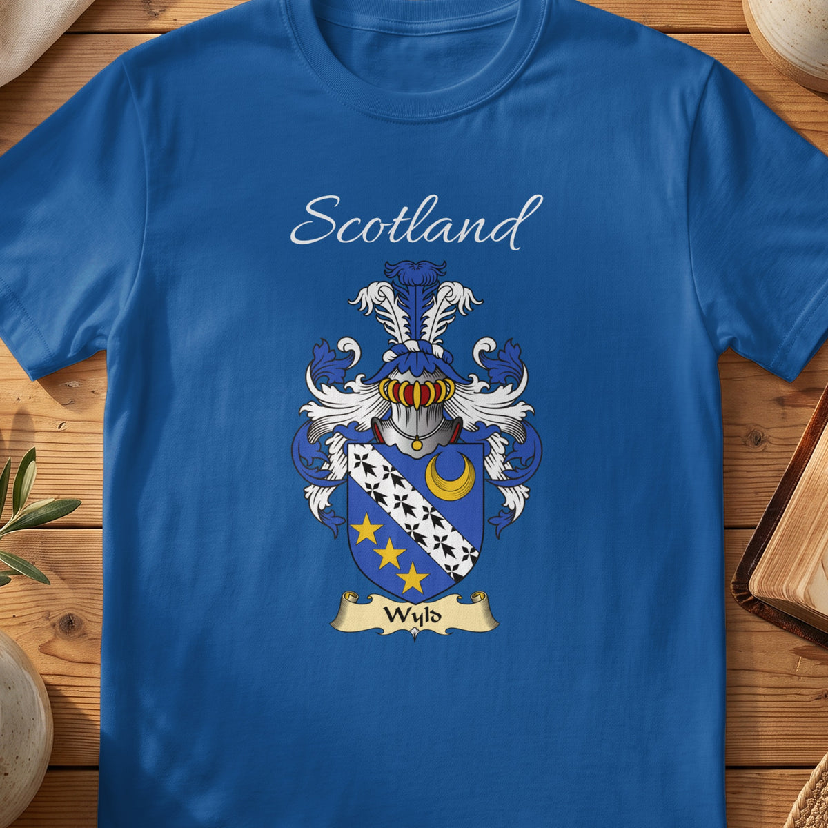 Royal blue Wyld unisex heritage T-shirt with the family shield and surname design.