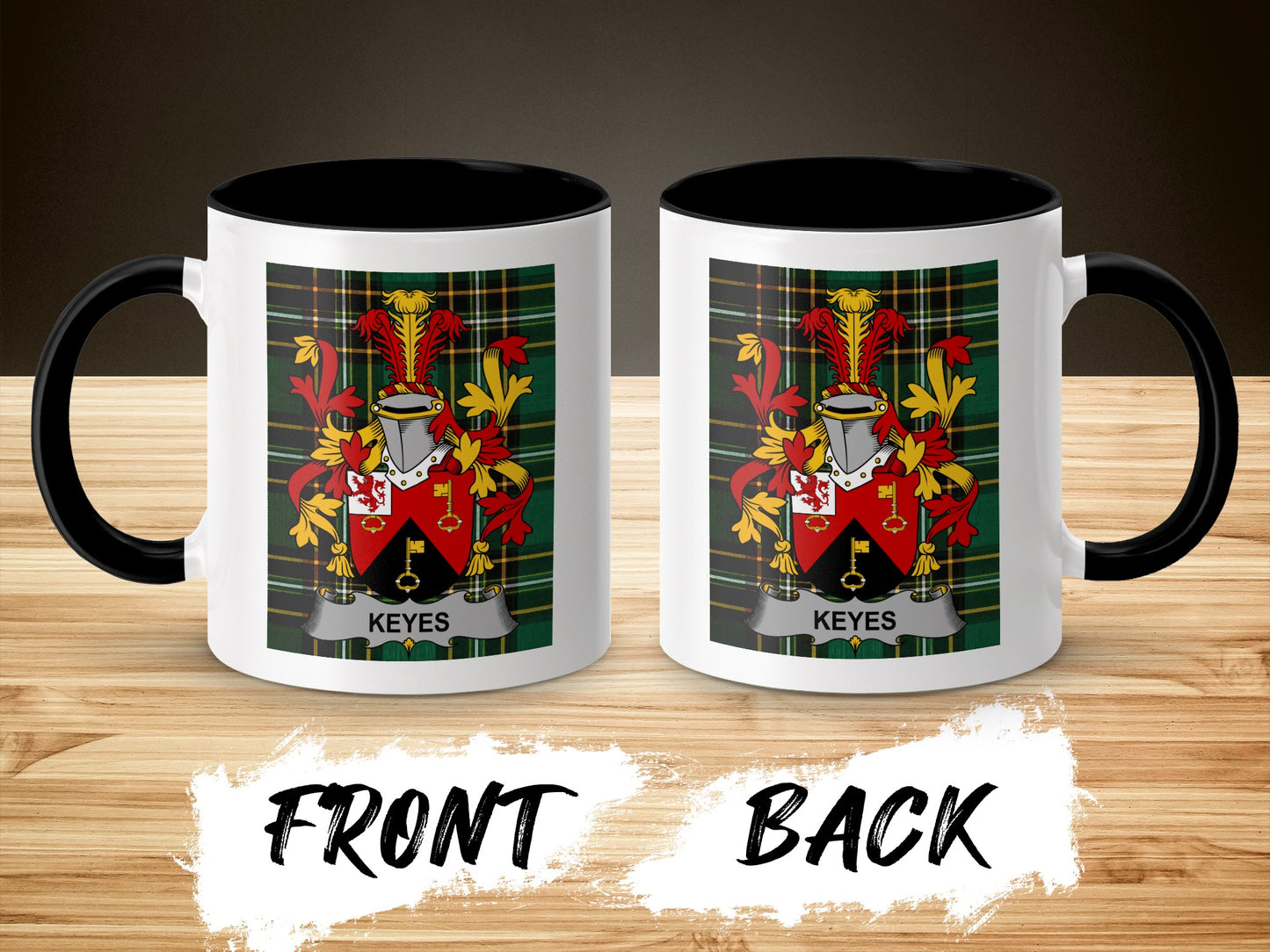 Mug with Keyes crest on front and back, black handle, on a wooden surface.