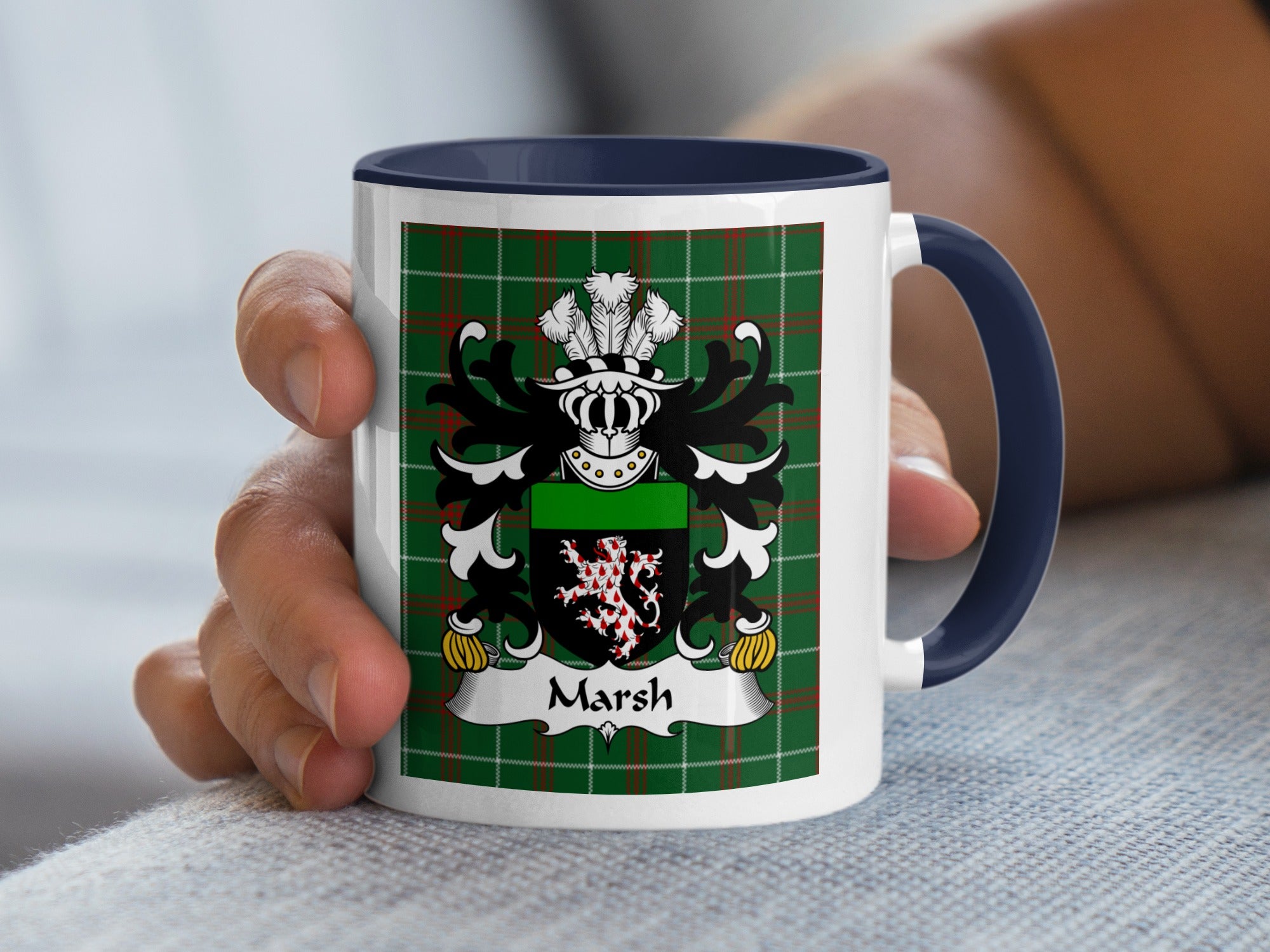 White mug with navy handle showing a green plaid background and the name "Marsh" on a banner.