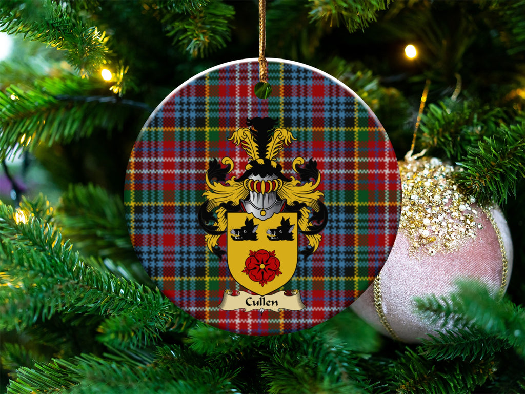 Cullen Scottish clan ceramic ornament with family crest on a Caledonia tartan background, hanging on a Christmas tree