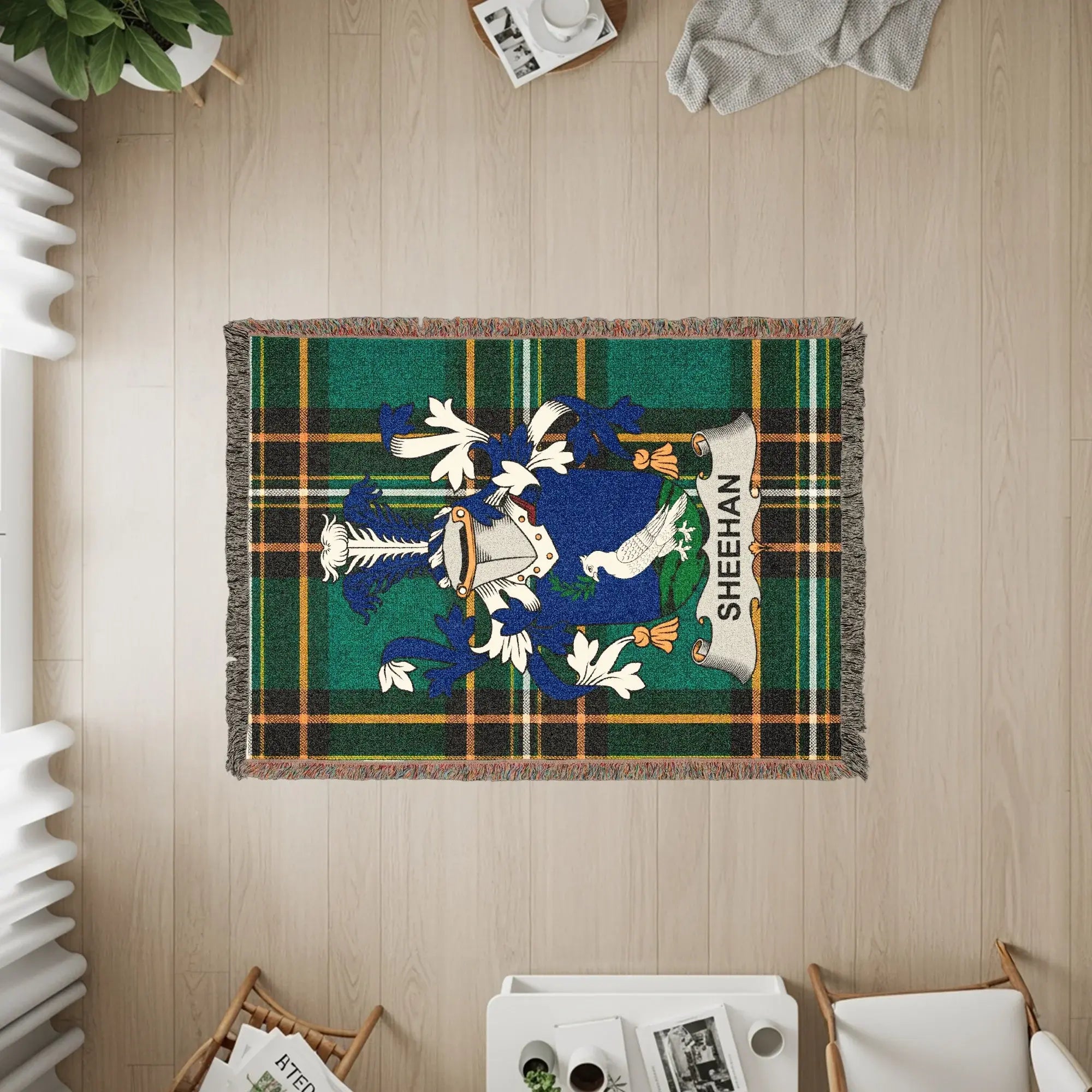 Tartan blanket with Sheehan coat of arms in the center.