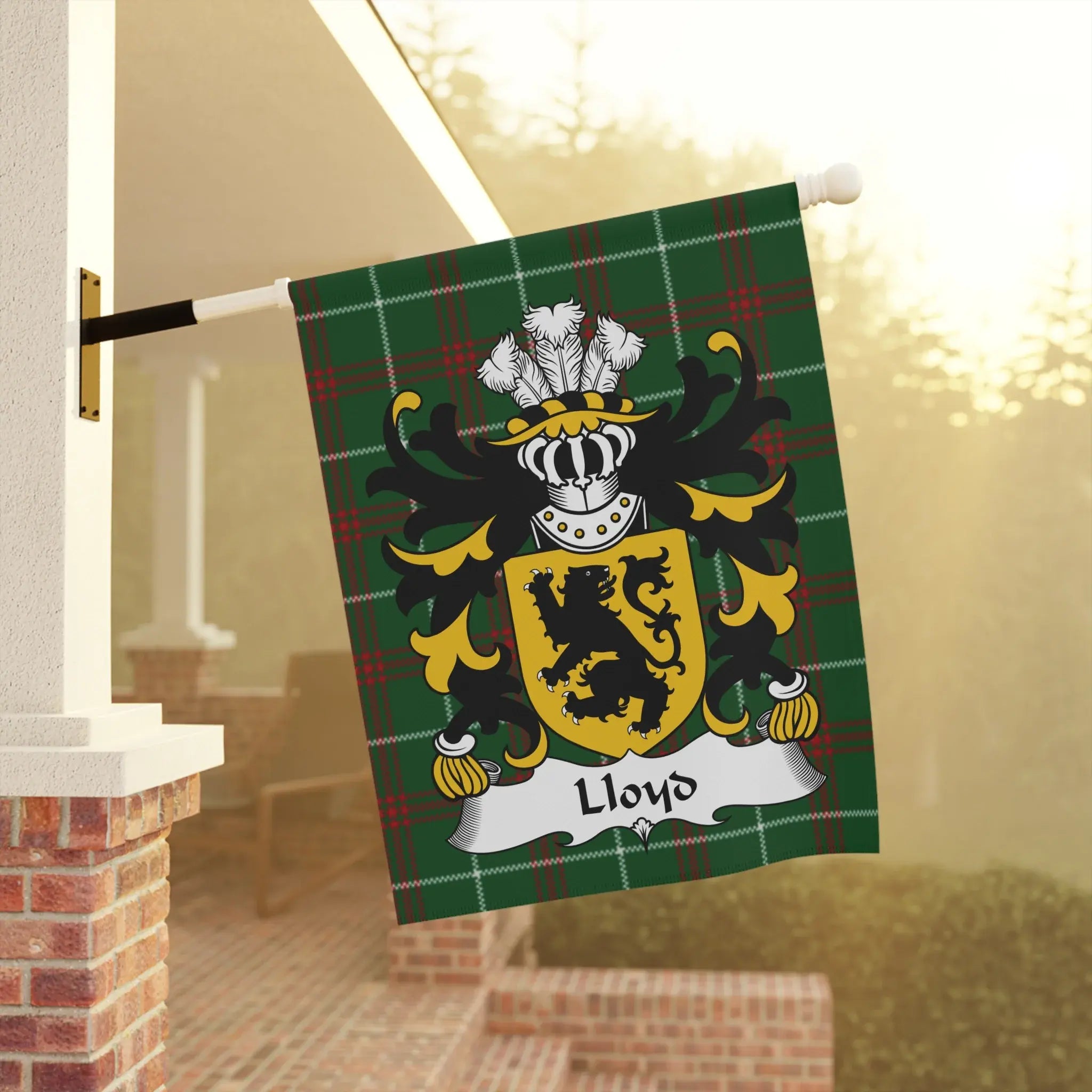Green tartan flag displaying the Lloyd family crest with a lion rampant.