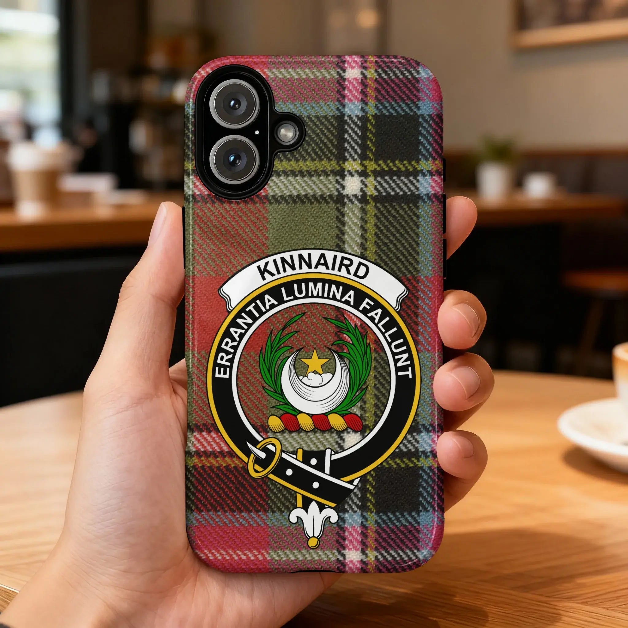 Clan Kinnaird crest phone case — iPhone fit shown, edge-to-edge tartan print with precise port cutouts