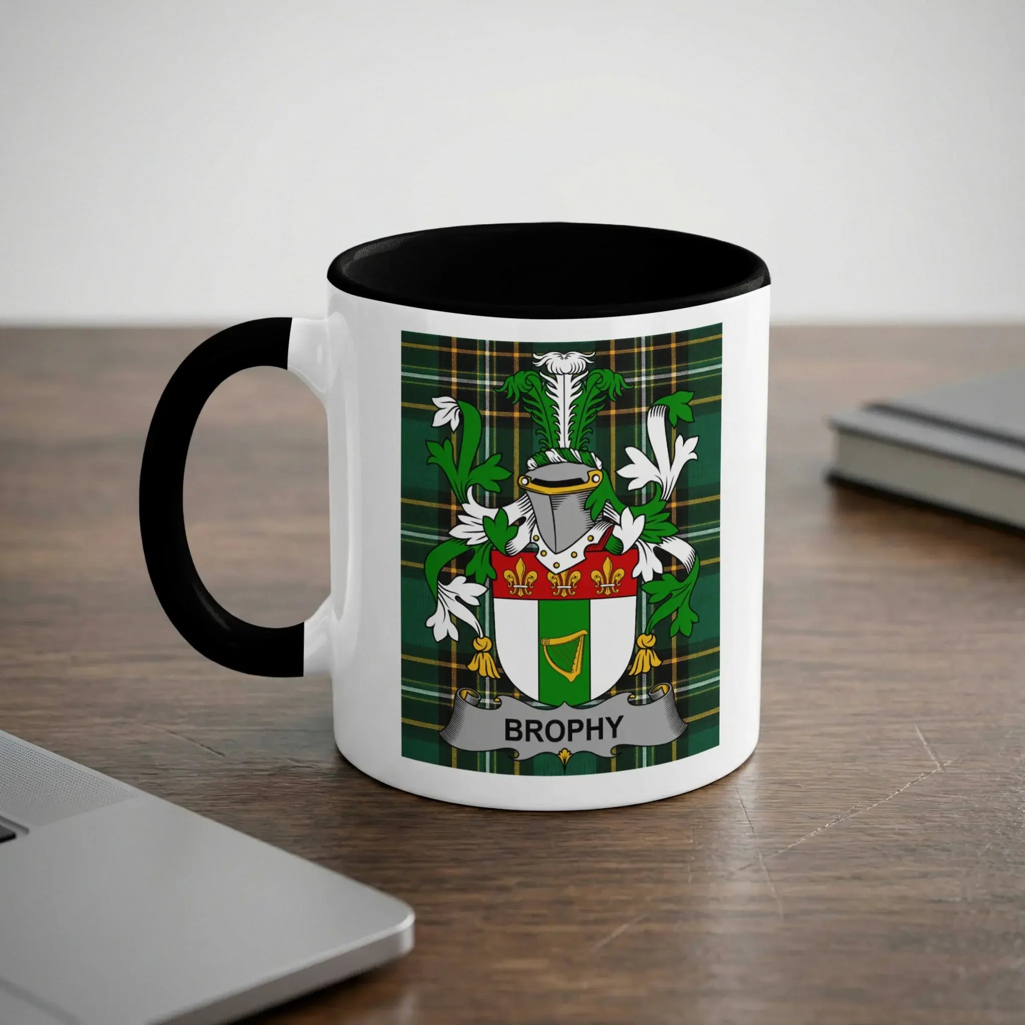 White mug with black handle displaying a green tartan with the Brophy coat of arms.