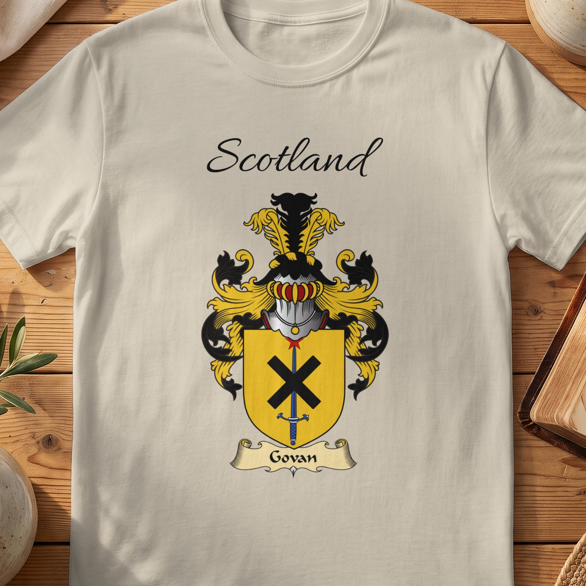 Sand Govan Scottish family shield T-shirt featuring a black diagonal cross on a gold shield