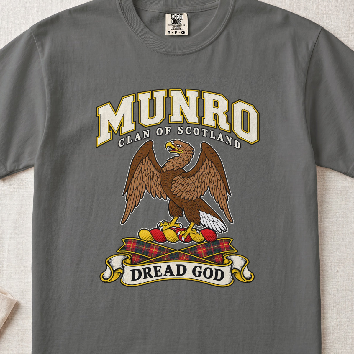 Munro Scottish clan T-shirt in Pepper, front view with a brown eagle with spread wings and motto banner.
