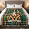 Tartan throw blanket with the Shaw family crest and name.