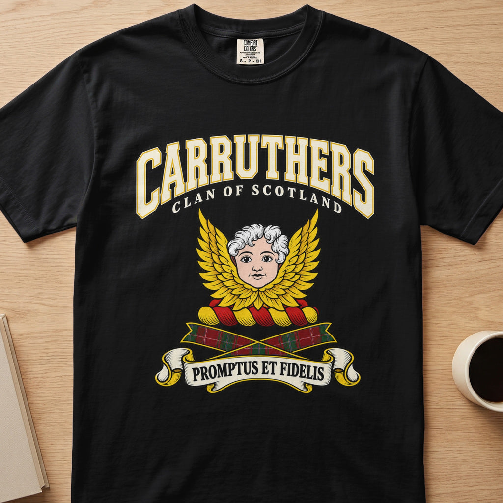 Carruthers pale face framed by golden wings graphic on a black Comfort Colors T-shirt, front view