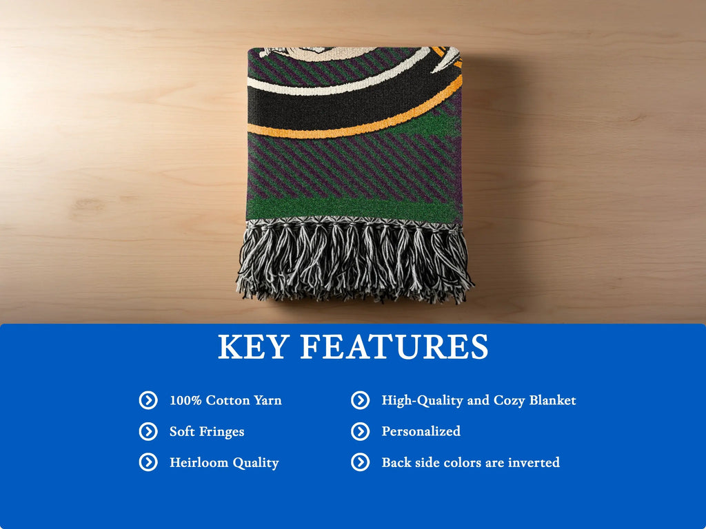 Clan Elphinstone cotton woven blanket folded — showing fringe edge and tartan weave texture