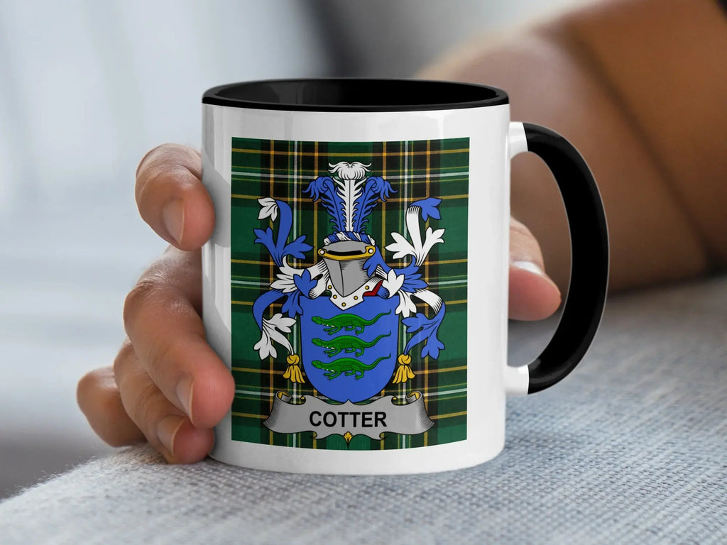 Mug with the Cotter family crest on a tartan background.