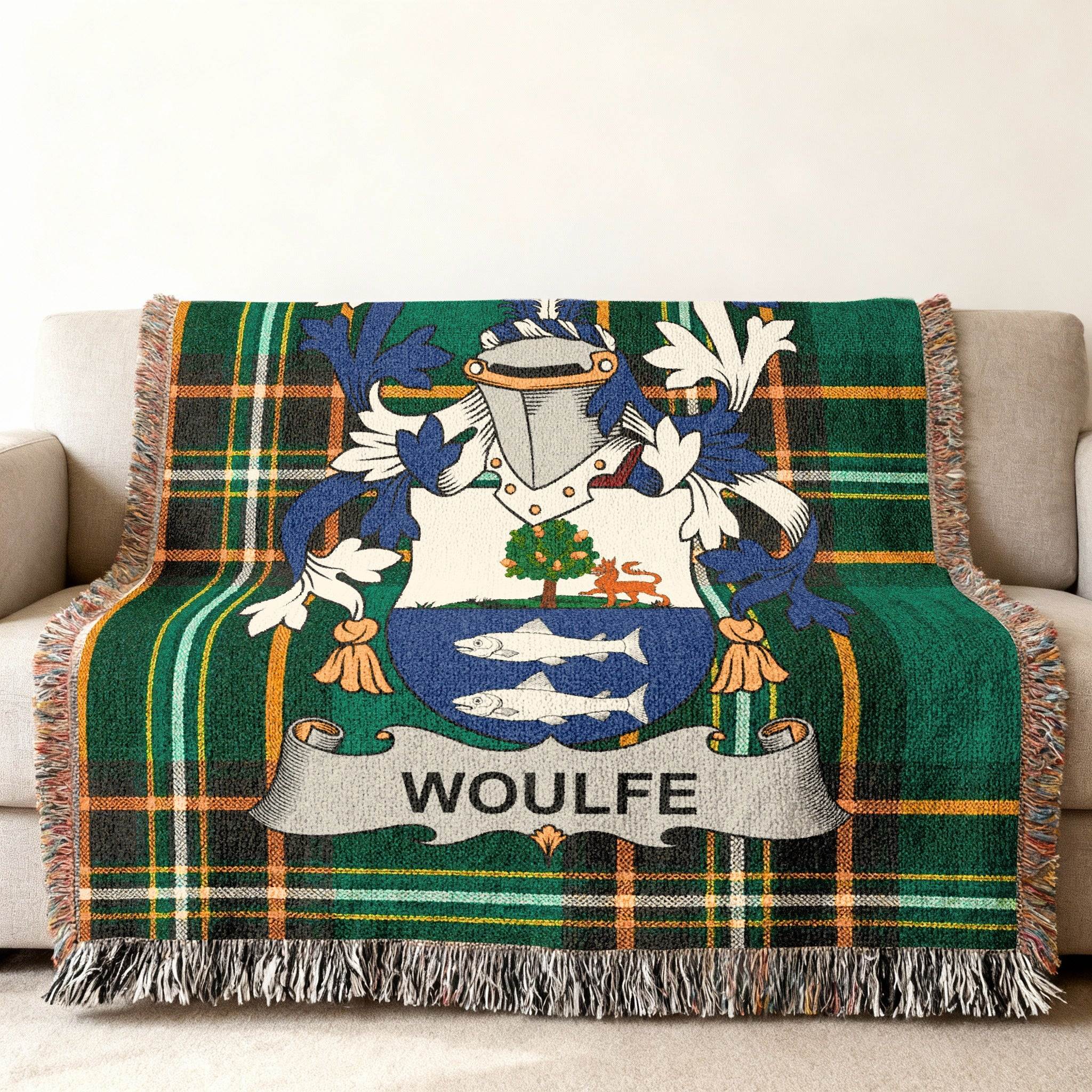 WOLFE family crest on a green and black plaid throw blanket.