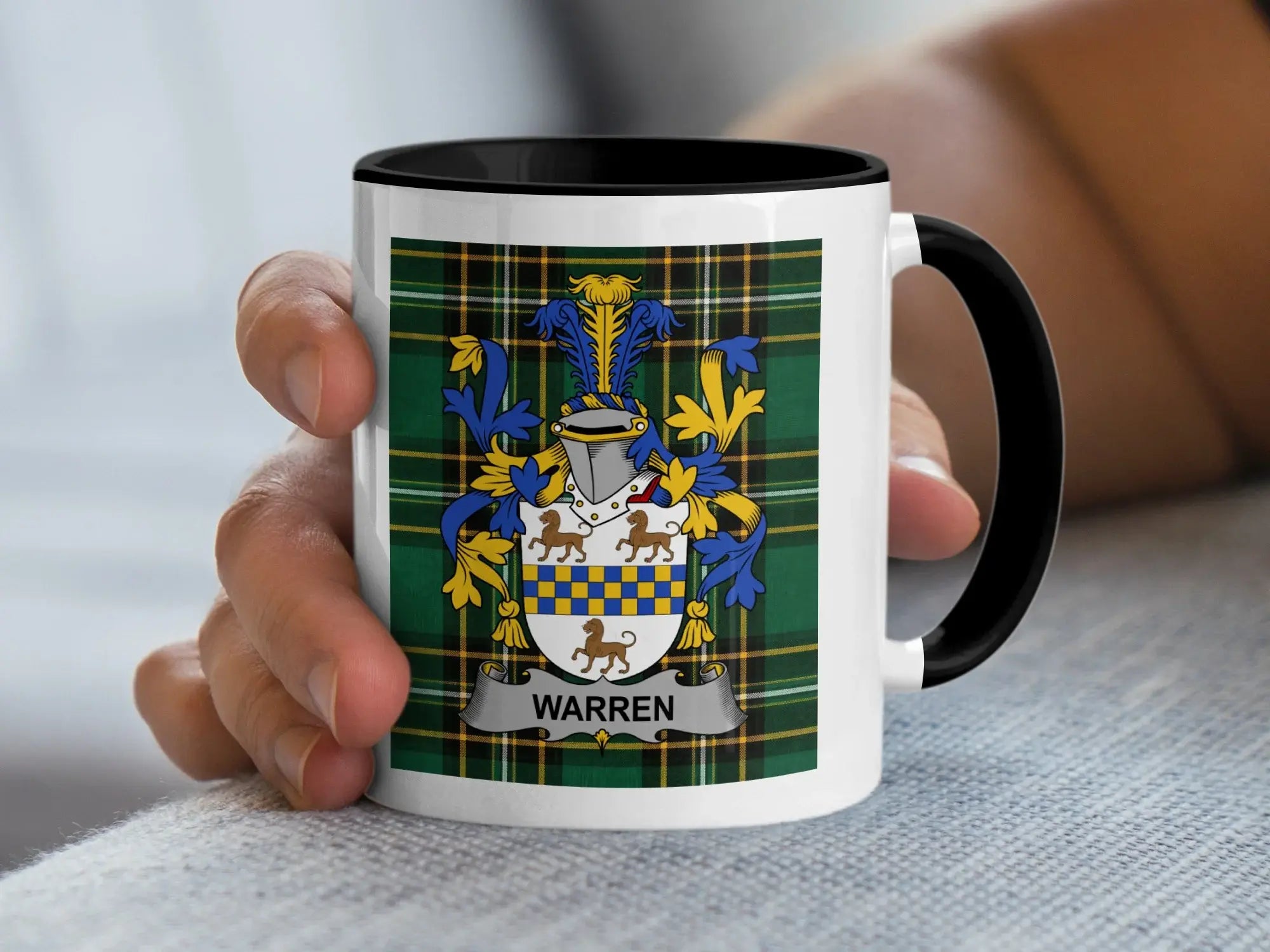 Mug with Warren family crest on tartan background.