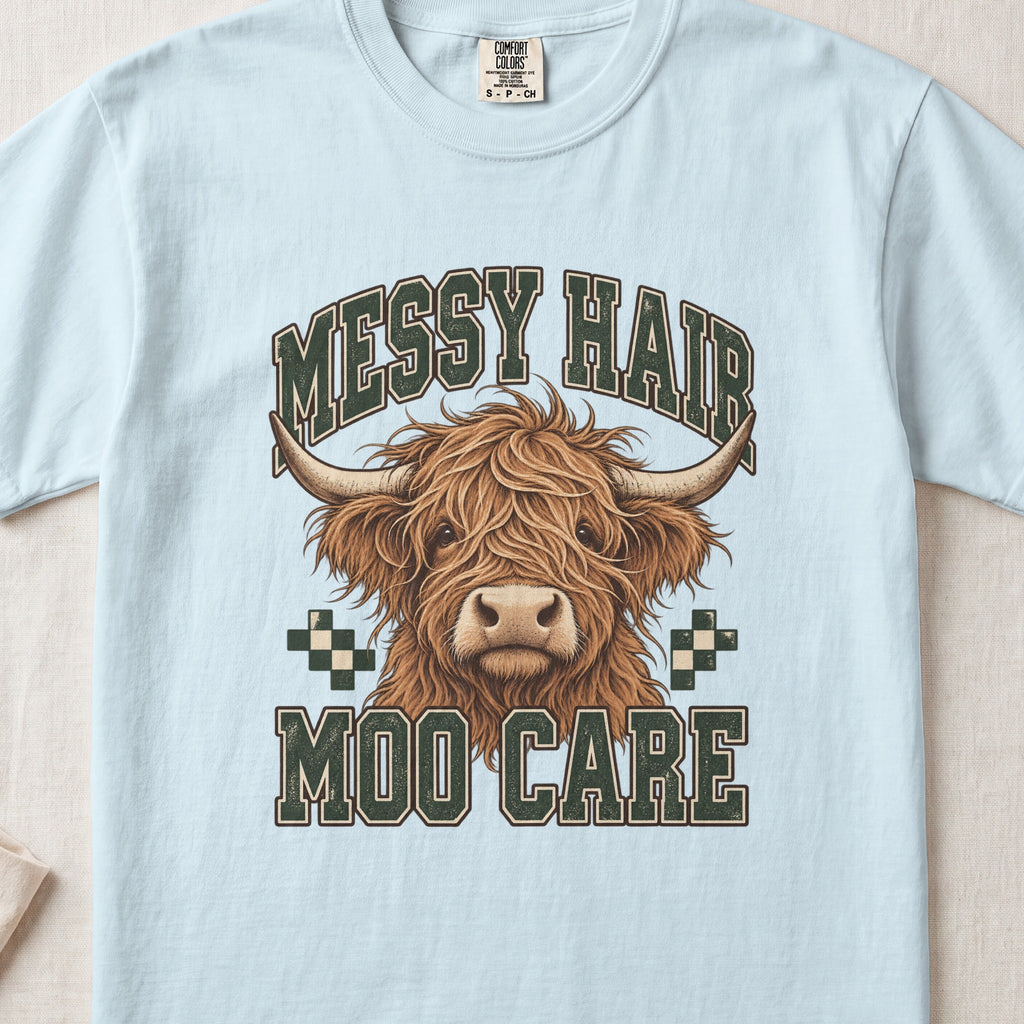 Messy Hair, Moo Care Highland cow design on a Chambray Comfort Colors 1717 T-shirt, flat lay