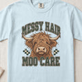 Messy Hair, Moo Care Highland cow design on a Chambray Comfort Colors 1717 T-shirt, flat lay