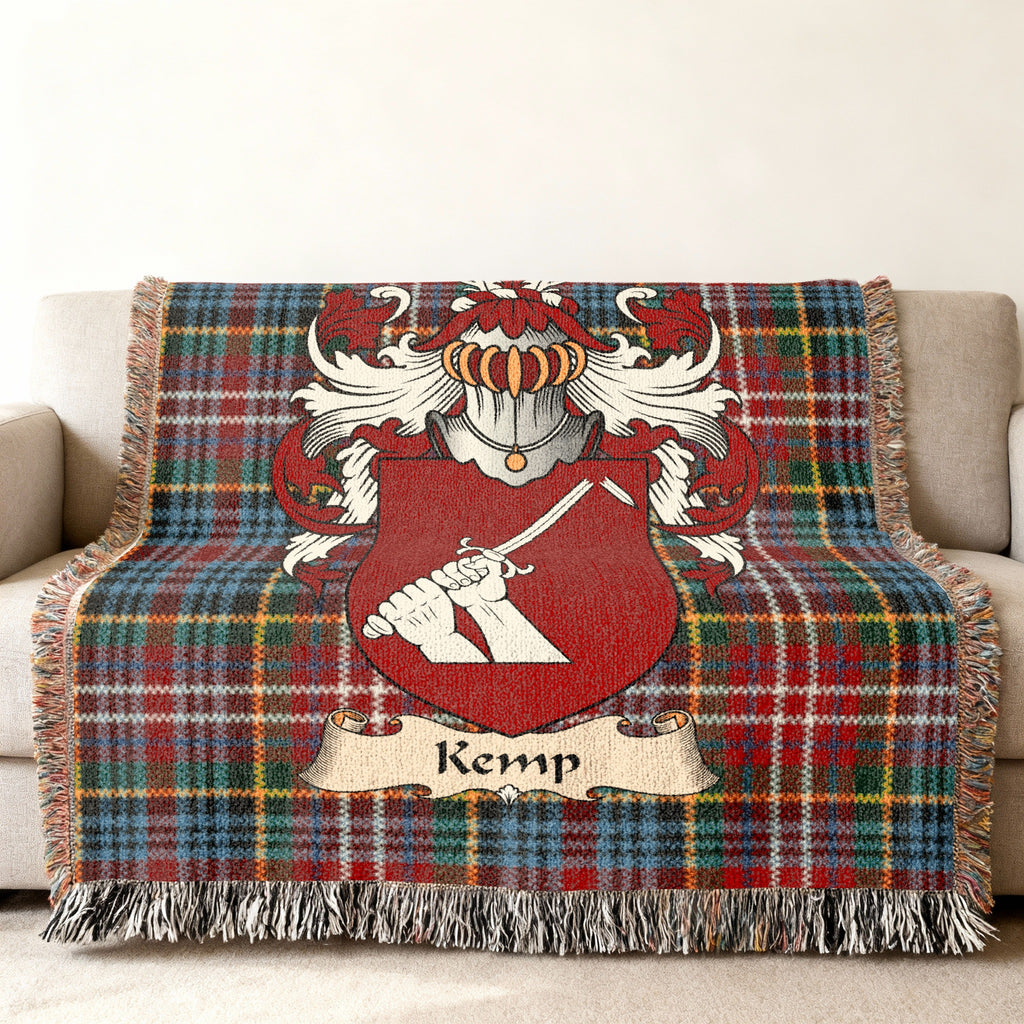 Kemp family crest emblem on a Caledonia tartan woven blanket