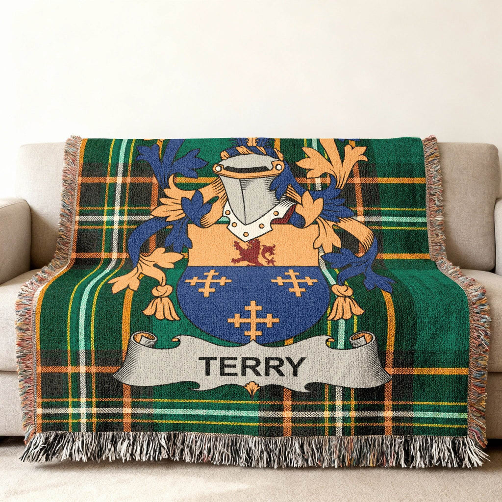 Tartan blanket with Terry family crest in blue, gold, and green.