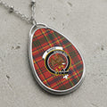 Oval Munro clan crest necklace with plaid, eagle, and motto "Dread God."