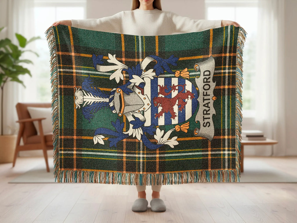 Green and blue plaid Stratford throw blanket with crest and fringe.