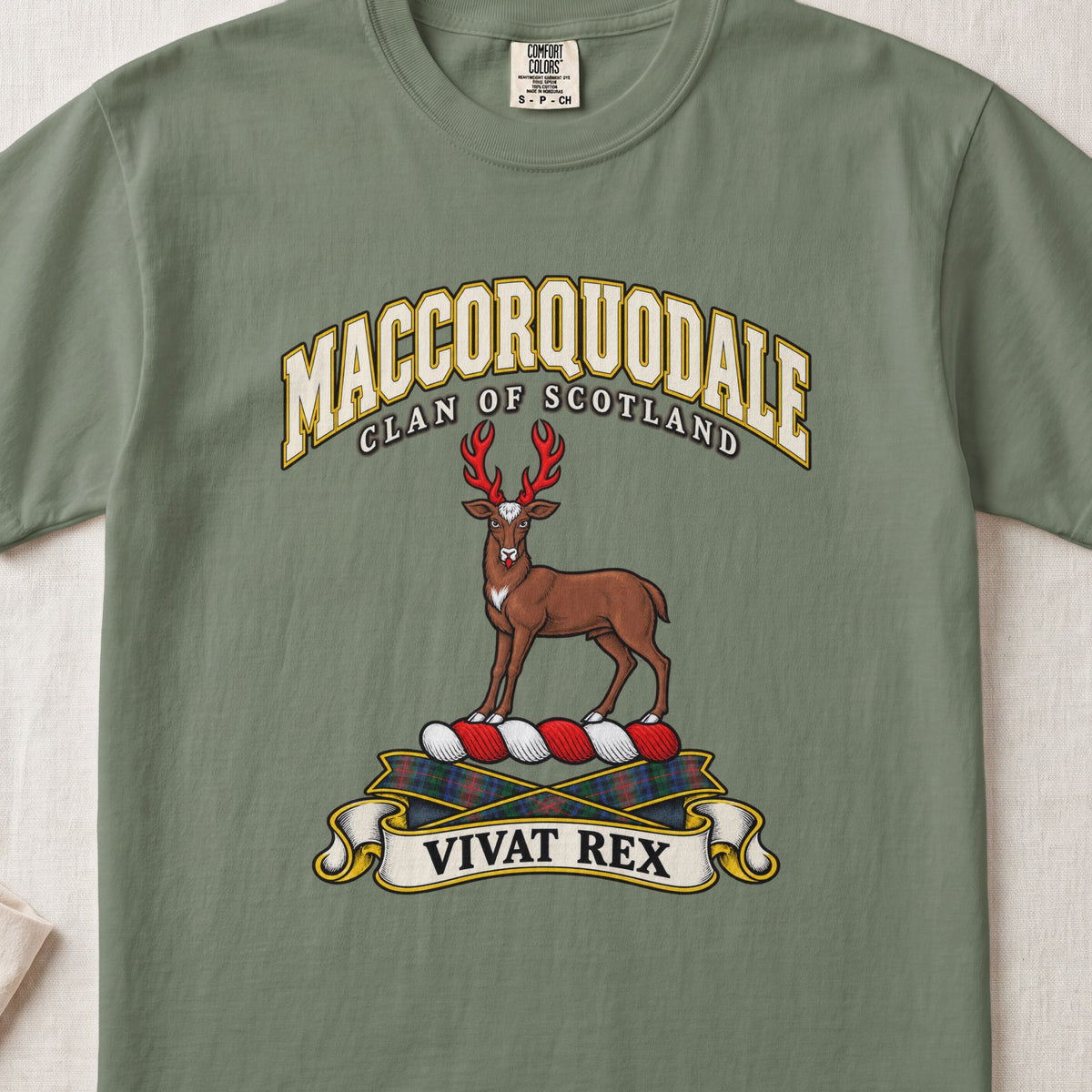 MacCorquodale Scottish clan T-shirt in Moss, front view with a brown stag with antlers and motto banner.