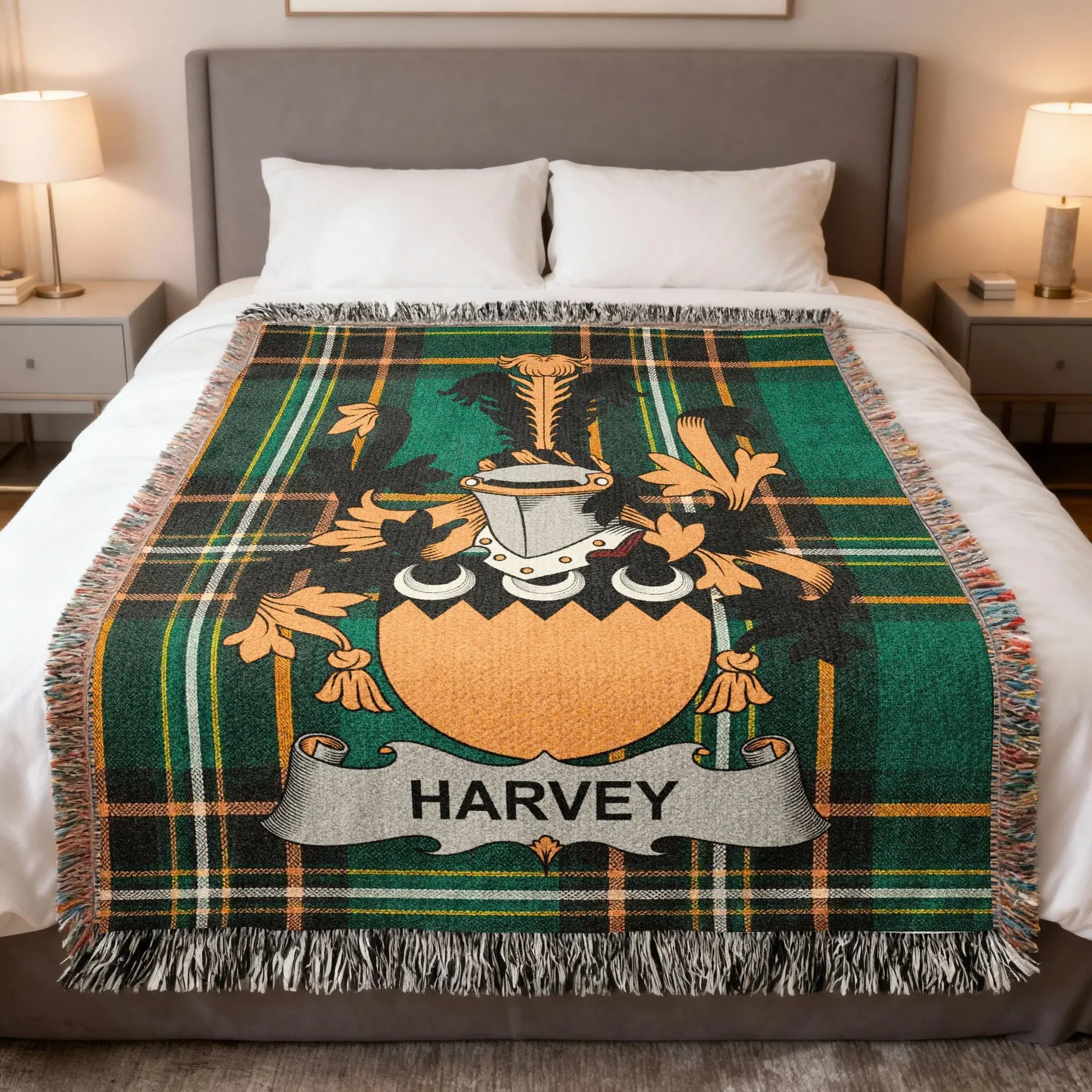 Tartan throw blanket with Harvey family crest in center.