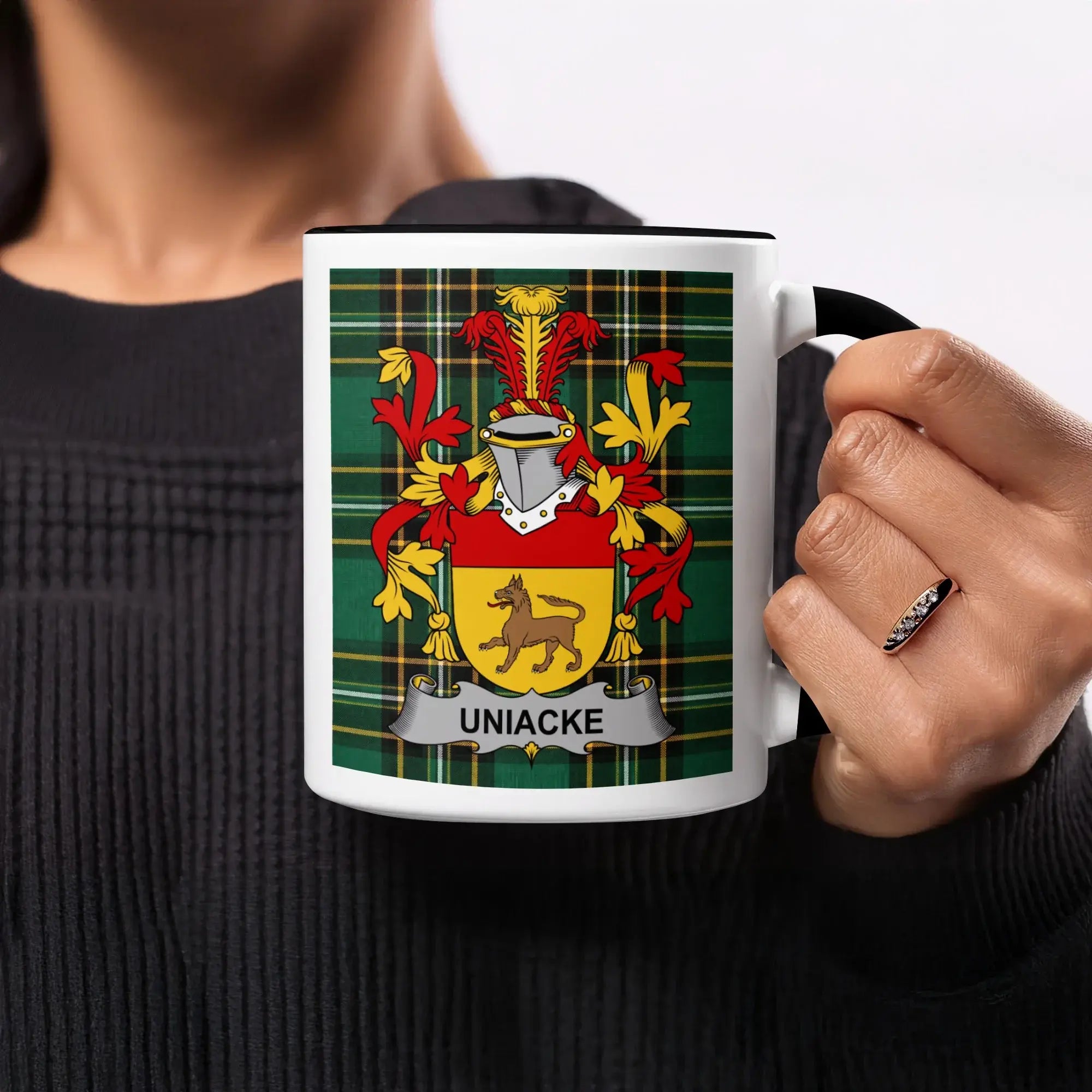 Mug featuring the Uniacke family crest on a tartan background.