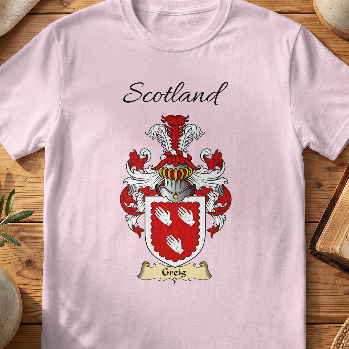 Light Pink Greig Scottish family shield T-shirt featuring three white hand motifs on red